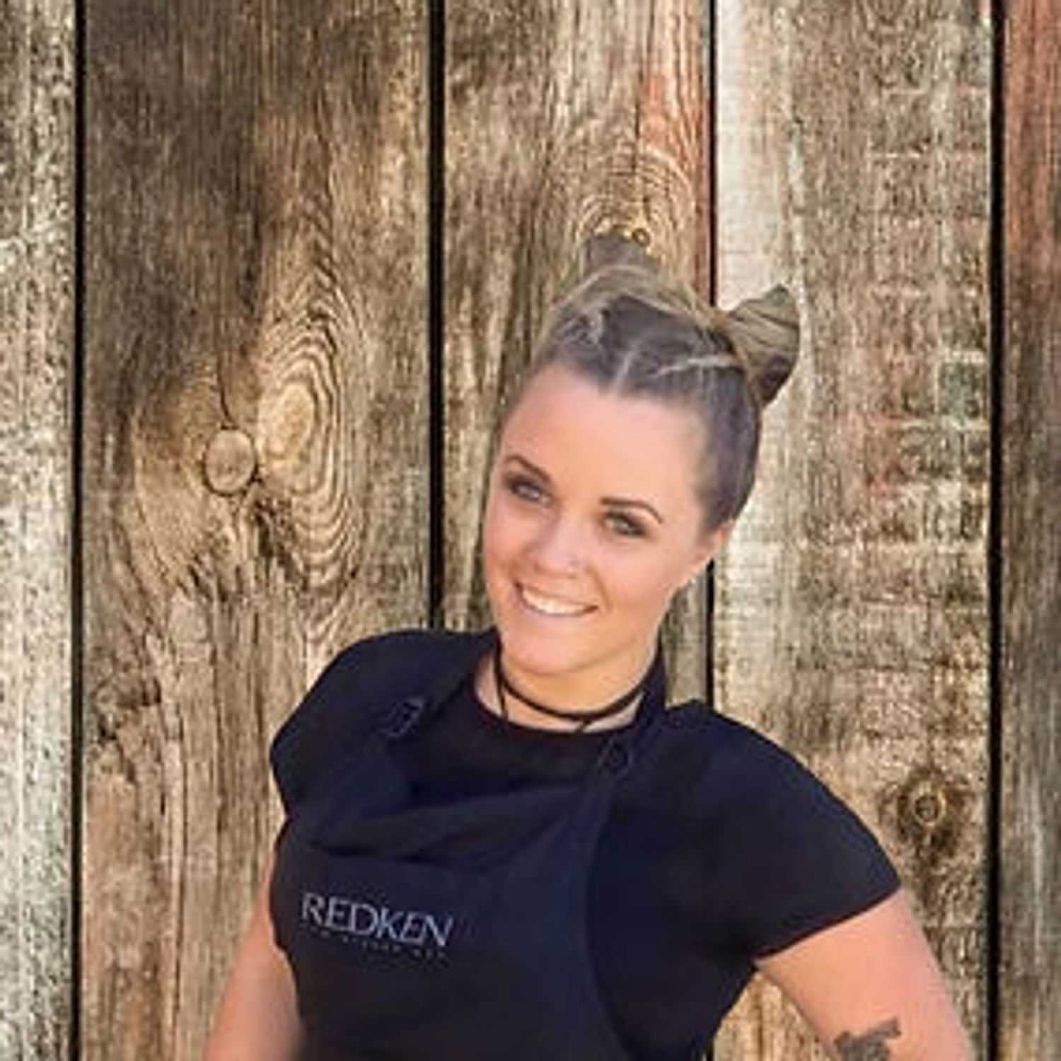 Portrait of Michelle Ronsman, a professional stylist at O Salon, showcasing their expertise and style.