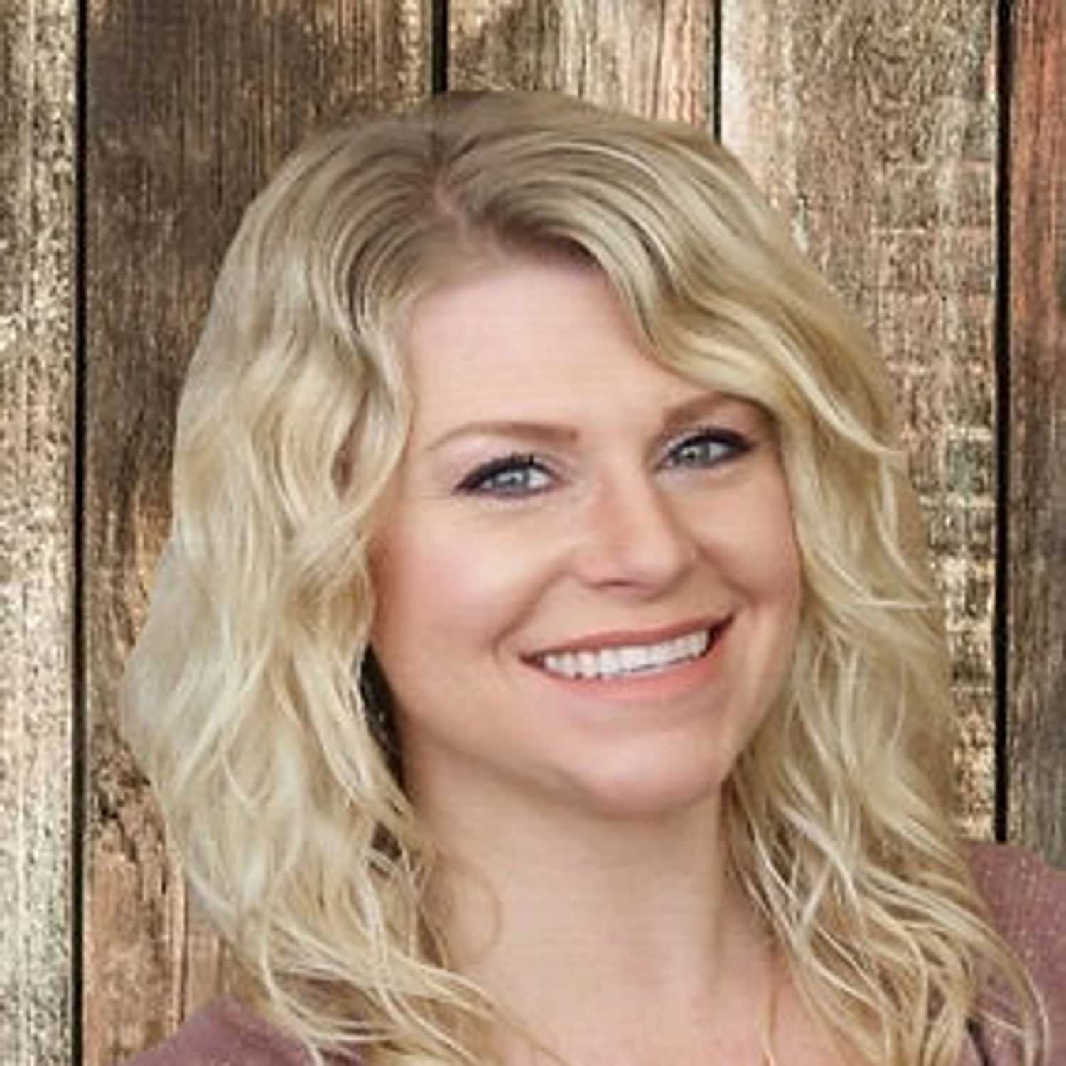 Portrait of Jillian Slais, a professional stylist at O Salon, showcasing their expertise and style.