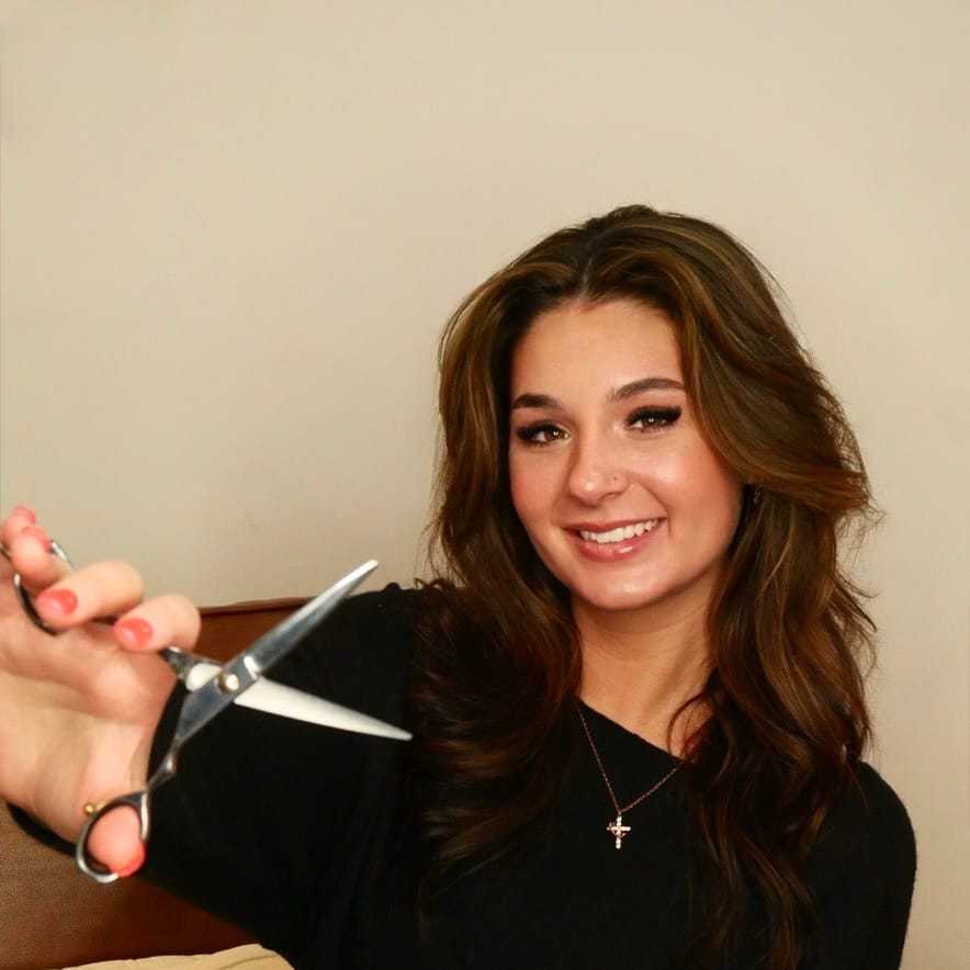 Portrait of Lexi Mulava, a professional stylist at O Salon, showcasing their expertise and style.