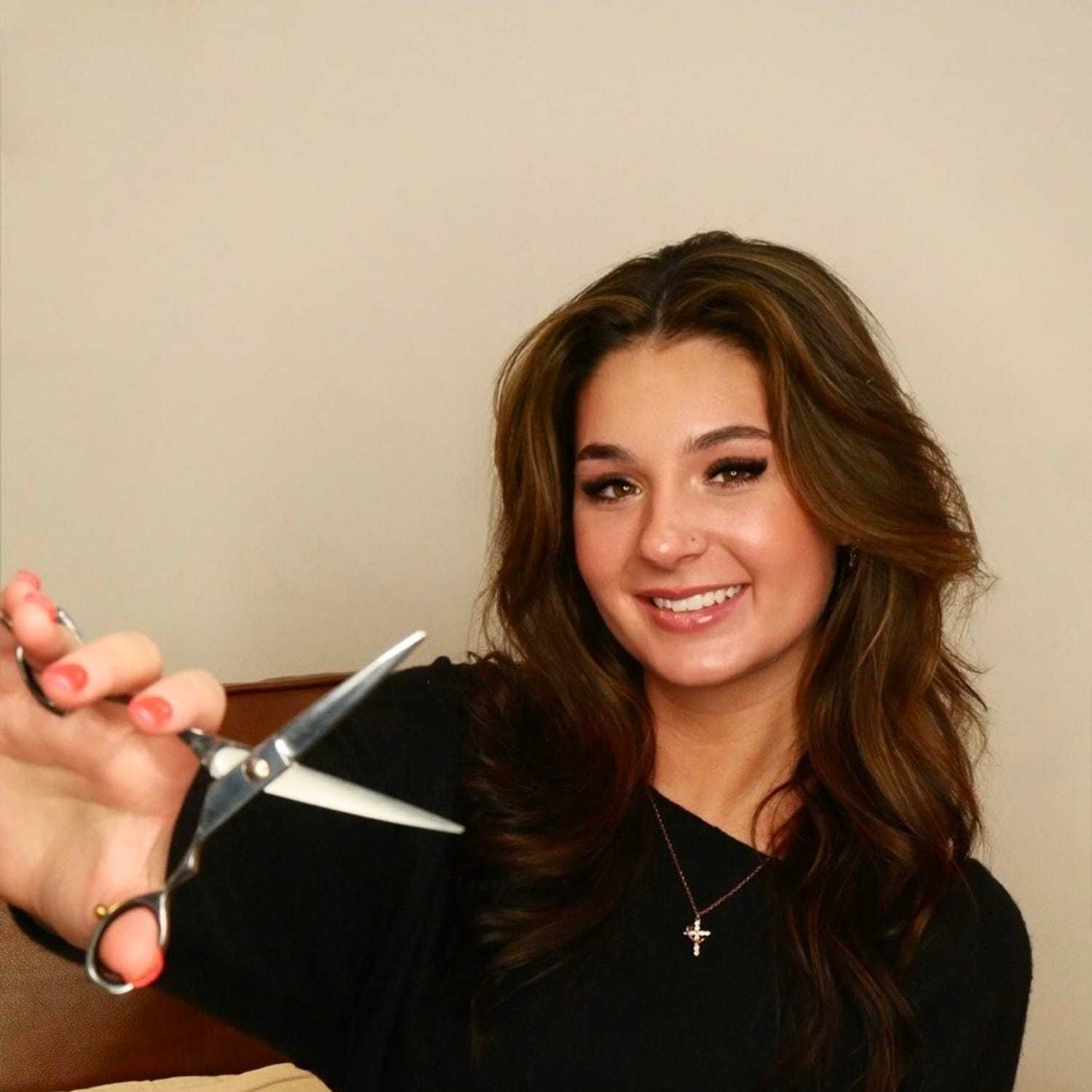 Portrait of Lexi Mulava, a professional stylist at O Salon, showcasing their expertise and style.