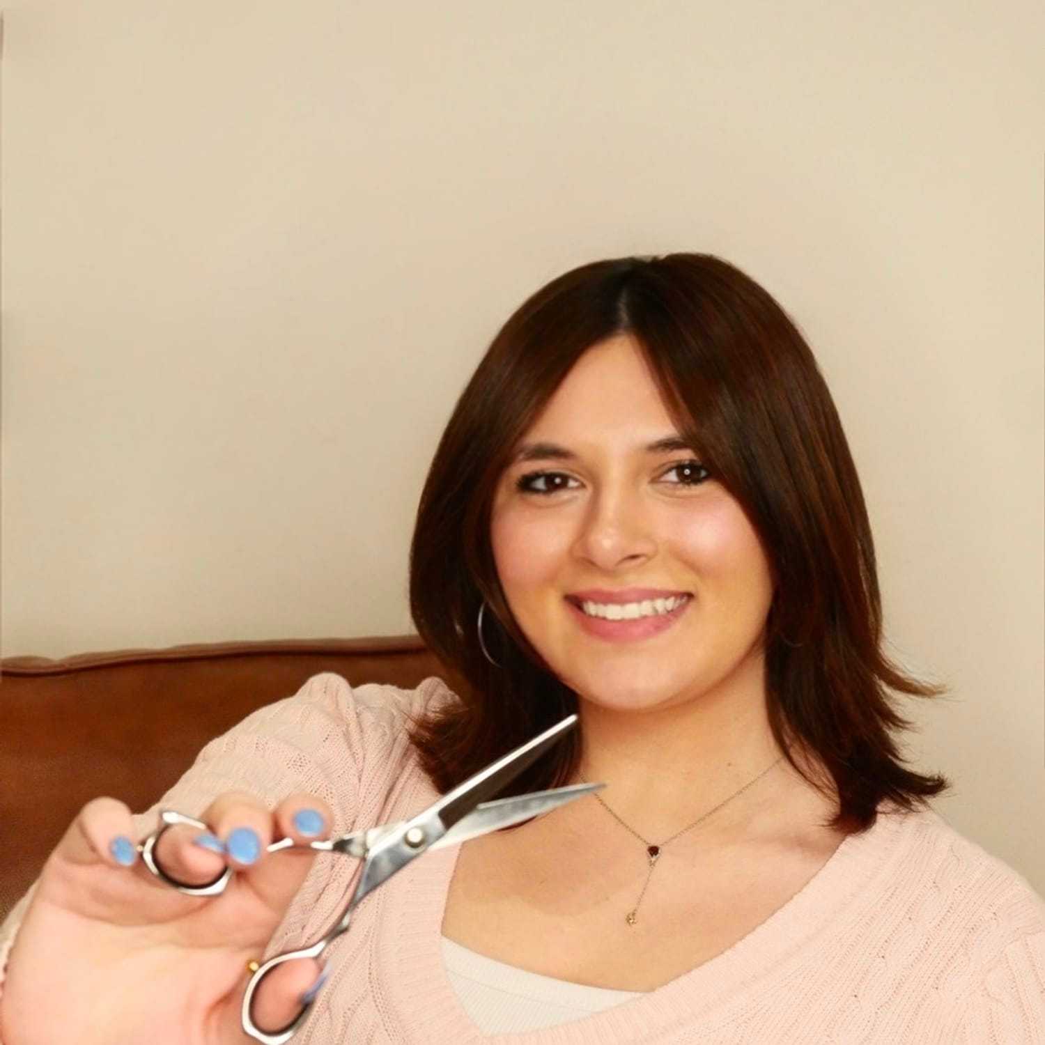 Portrait of Isabel Waldron, a professional stylist at O Salon, showcasing their expertise and style.