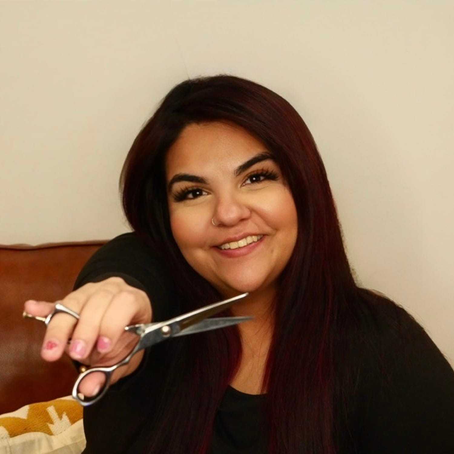 Portrait of Natalie Melendez, a professional stylist at O Salon, showcasing their expertise and style.