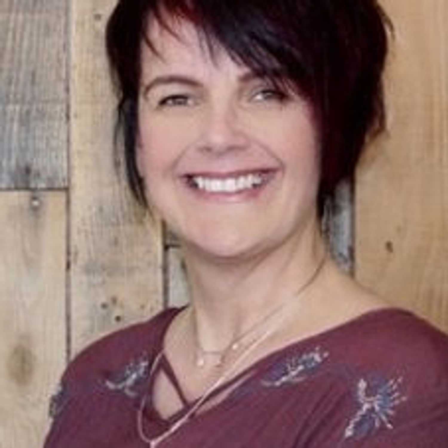 Portrait of Lorraine Mercer, a professional stylist at O Salon, showcasing their expertise and style.